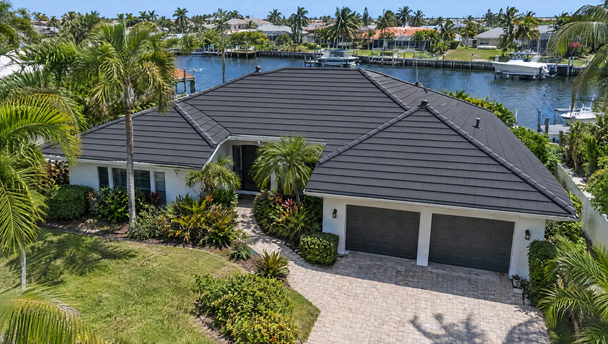 Florida home after a NexRoof roof replacement with a clean new charcoal roof